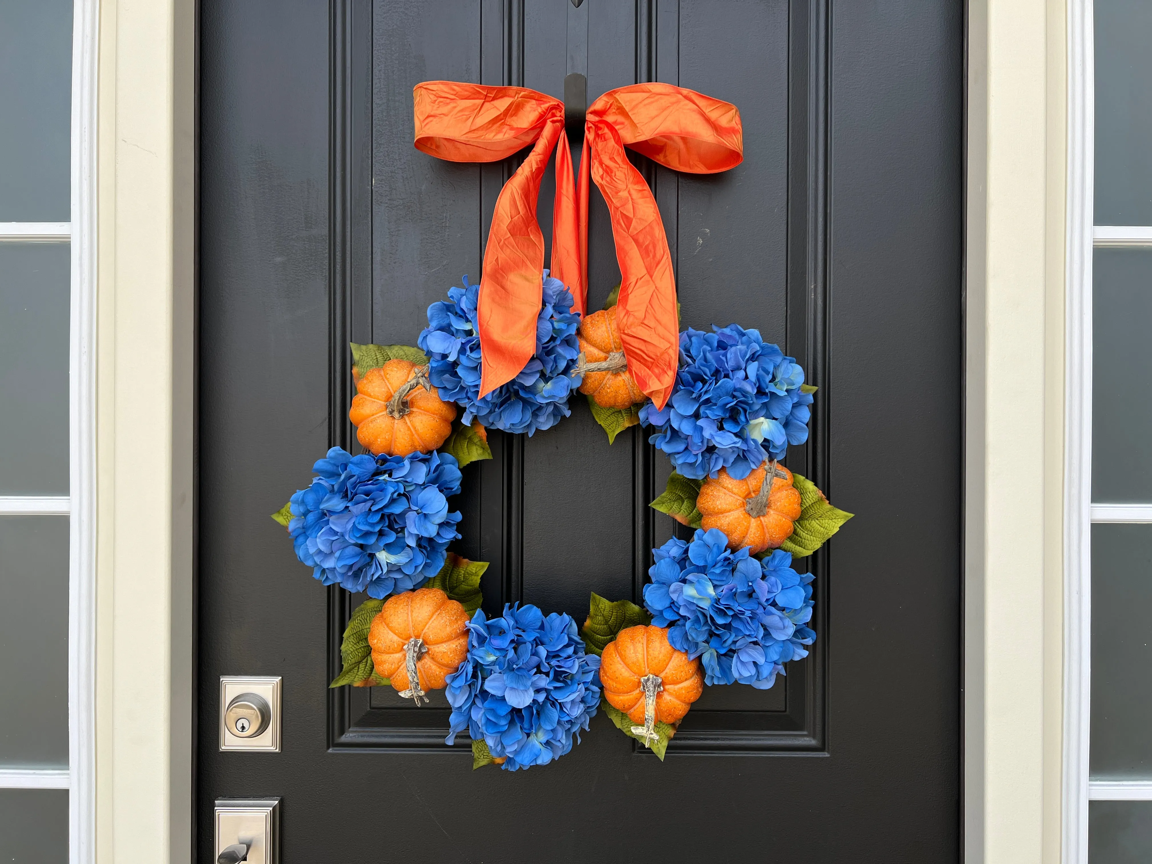 Vibrant Orange Pumpkin and Blue Hydrangea Wreath