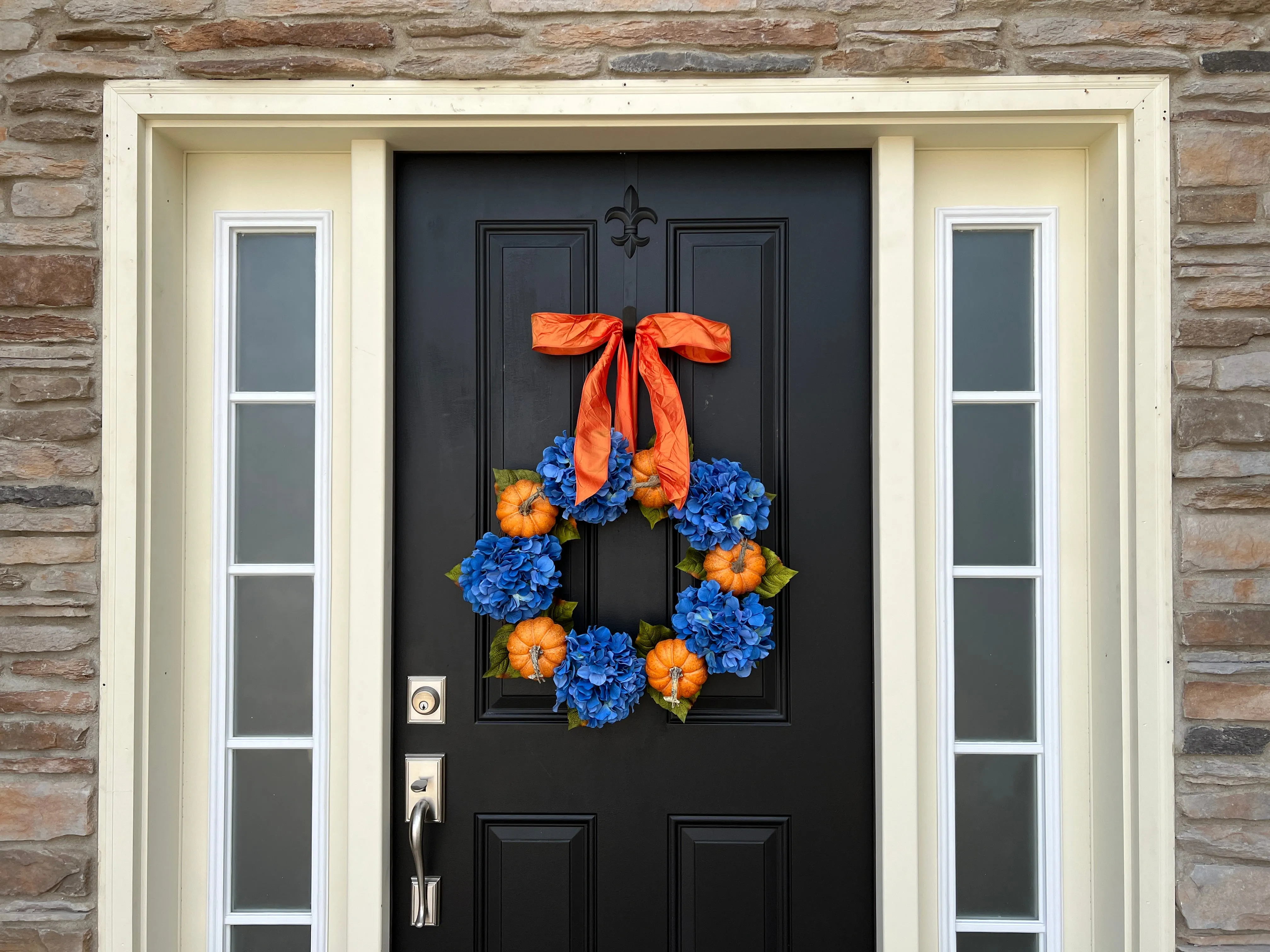 Vibrant Orange Pumpkin and Blue Hydrangea Wreath